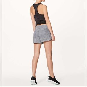 Lululemon Tracker Short V *4" inseam 
Fractal Alpine White Black / Black size 4